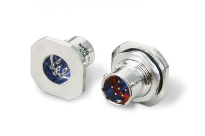 DT07H-8-4PN hermetically sealed Detoronics connectors with jam nut receptacle and shiny metal finish, showing four gold-plated pins and a large threaded section